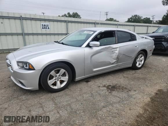2012 Dodge Charger SE z VIN 2C3CDXBG2CH119614, wystawiony jako Copart lot #89668065 z przebiegiem 198 166 mil mil oraz Szkoda całkowita • Salvage title. Historia ofert i sprzedaży dostępna na DreamBid. Obrazek 1.
