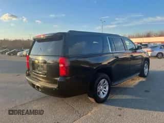 2015 Chevrolet Suburban z VIN 1GNSKHEC4FR252172, wystawiony jako Copart lot #91075985 z przebiegiem 213 365 mil mil oraz Czysty tytuł • Clean title. Historia ofert i sprzedaży dostępna na DreamBid. Obrazek 4.