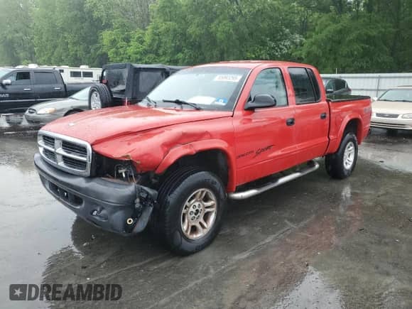 2004 Dodge Dakota Sport с VIN 1D7HG38N14S770790, выставлен на аукционе Copart как лот 55993295 с пробегом 210 458 миль миль и Списание • Salvage title. История ставок и продаж доступна на DreamBid. Изображение 1.