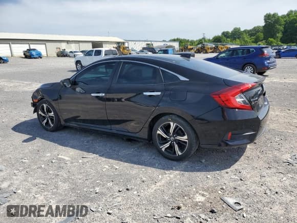 ✅ 2017 Honda Civic Touring • VIN: 19XFC1F96HE030457 • Lot: 60144055. Listed on Copart with 153,798 mi. Free auction sales archive from the USA and detailed vehicle history report at DreamBid. Image 2.