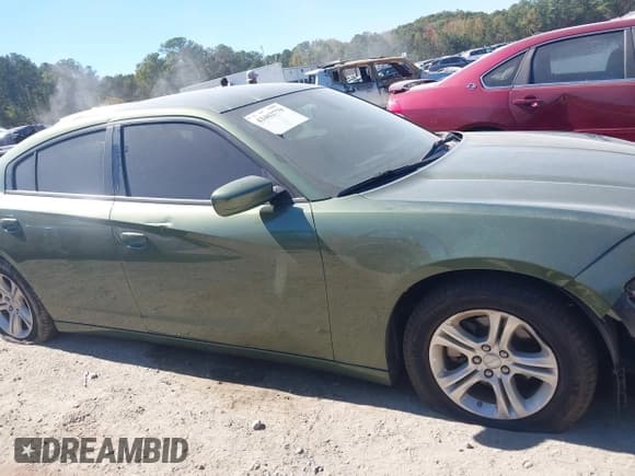 ✅ 2022 Dodge Charger SXT • VIN: 2C3CDXBGXNH176906 • Lot: 43462779. Listed on IAAI with 43,556 mi. Free auction sales archive from the USA and detailed vehicle history report at DreamBid. Image 13.