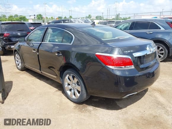 ✅ 2013 Buick LaCrosse Premium 2 • VIN: 1G4GH5G31DF214272 • Лот: 42565711. Опубликован ранее на IAAI с пробегом 127 949 миль. Бесплатный доступ к архиву аукционных продаж из США и подробный отчёт об истории автомобиля на DreamBid. Изображение 3.