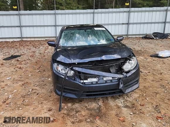 ✅ 2016 Honda Civic LX • VIN: 19XFC2F52GE034524 • Lot: 84631585. Listed on Copart with 124,514 mi. Free auction sales archive from the USA and detailed vehicle history report at DreamBid. Image 13.