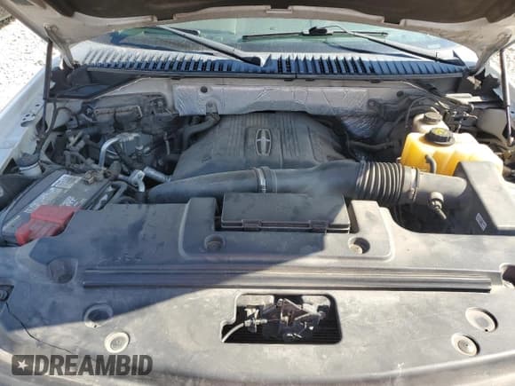 ✅ 2015 Lincoln Navigator • VIN: 5LMJJ3JT8FEJ03084 • Lot: 84768735. Wystawiony na Copart z przebiegiem 163 136 mil. Bezpłatny archiwum sprzedaży aukcyjnych z USA i szczegółowy raport historii pojazdu na DreamBid. Zdjęcie 12.