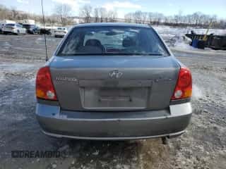 2003 Hyundai Accent GL z VIN KMHCG45C33U469496, wystawiony jako Copart lot #45926595 z przebiegiem 77 737 mil mil oraz Szkoda całkowita • Salvage title. Historia ofert i sprzedaży dostępna na DreamBid. Obrazek 6.