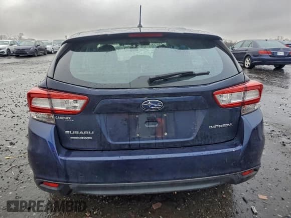 ✅ 2019 Subaru Impreza • VIN: 4S3GTAB6XK3730626 • Lot: 94811785. Listed on Copart with 56,911 mi. Free auction sales archive from the USA and detailed vehicle history report at DreamBid. Image 6.