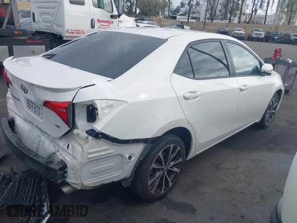 ✅ 2018 Toyota Corolla LE • VIN: 5YFBURHE8JP787045 • Lot: 43715533. Listed on IAAI with 105,003 mi. Free auction sales archive from the USA and detailed vehicle history report at DreamBid. Image 4.