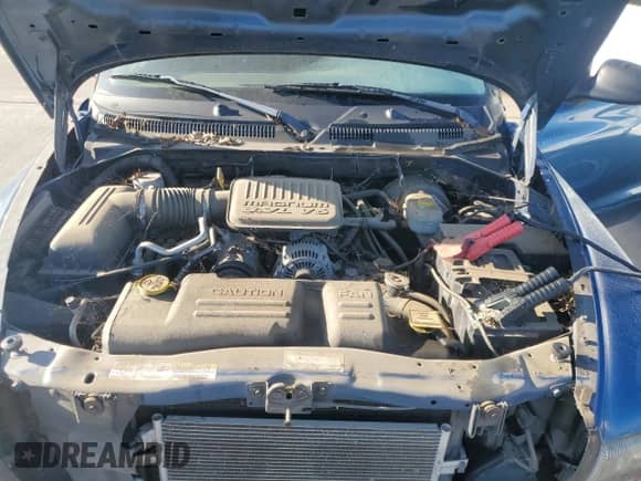 2004 Dodge Dakota SLT z VIN 1D7HG48K14S774396, wystawiony jako Copart lot #51699175 z przebiegiem 206 799 mil mil oraz Czysty tytuł • Clean title. Historia ofert i sprzedaży dostępna na DreamBid. Obrazek 11.