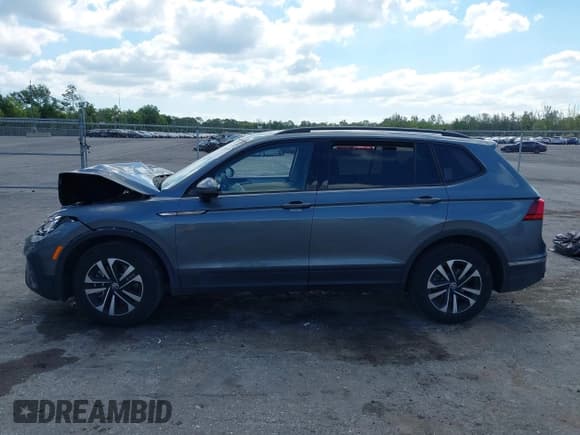 ✅ 2024 Volkswagen Tiguan S • VIN: 3VVRB7AX5RM120314 • Lot: 42016531. Listed on IAAI with 11,373 mi. Free auction sales archive from the USA and detailed vehicle history report at DreamBid. Image 14.