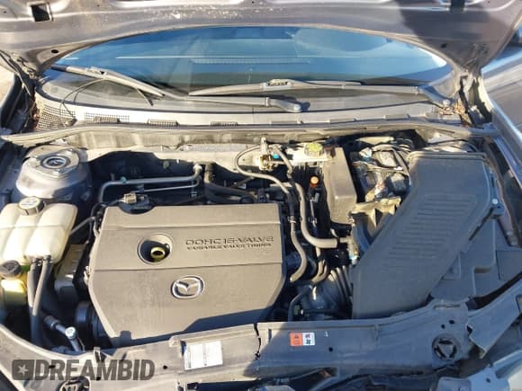 ✅ 2007 Mazda 3 i Sport • VIN: JM1BK12F771765771 • Lot: 41208925. Wystawiony na IAAI z przebiegiem 139 306 mil. Bezpłatny archiwum sprzedaży aukcyjnych z USA i szczegółowy raport historii pojazdu na DreamBid. Zdjęcie 10.