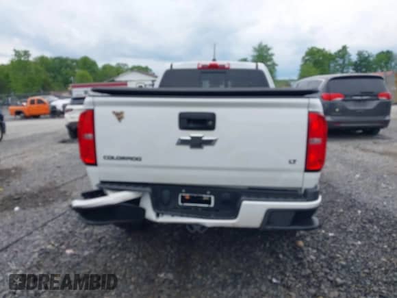 2020 Chevrolet Colorado 4WD LT z VIN 1GCHTCEA0L1224915, wystawiony jako IAAI lot #42300579 z przebiegiem 62 623 mil mil oraz . Historia ofert i sprzedaży dostępna na DreamBid. Obrazek 17.