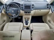 ✅ 2012 Volkswagen Tiguan S • VIN: WVGBV7AX5CW555151 • Lot: 94964635. Listed on Copart with 119,619 mi. Free auction sales archive from the USA and detailed vehicle history report at DreamBid. Image 8.