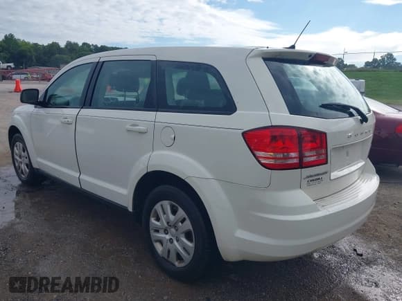 ✅ 2014 Dodge Journey American Value • VIN: 3C4PDCAB2ET247194 • Lot: 42968008. Listed on IAAI with 142,469 mi. Free auction sales archive from the USA and detailed vehicle history report at DreamBid. Image 3.