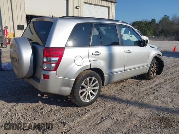 ✅ 2013 Suzuki Grand Vitara Limited • VIN: JS3TE0D74D4100091 • Lot: 41684748. Listed on IAAI with 176,696 mi. Free auction sales archive from the USA and detailed vehicle history report at DreamBid. Image 4.