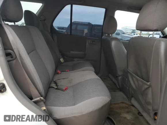 ✅ 2004 Isuzu Rodeo S • VIN: 4S2CK58W444300446 • Lot: 58813605. Wystawiony na Copart z przebiegiem 236 519 mil. Bezpłatny archiwum sprzedaży aukcyjnych z USA i szczegółowy raport historii pojazdu na DreamBid. Zdjęcie 11.