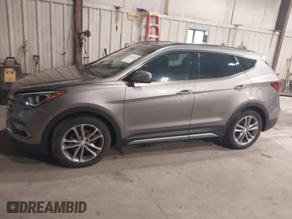 2017 Hyundai Santa Fe 2.0T z VIN 5XYZUDLA4HG424259, wystawiony jako IAAI lot #42657783 z przebiegiem 213 040 mil mil oraz . Historia ofert i sprzedaży dostępna na DreamBid. Obrazek 14.