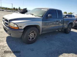 2003 Dodge Dakota with VIN 1D7HL12X03S247060, listed as a Copart auction lot 90380375 with 191,703 mi miles and Salvage title. Bid and sale history available at DreamBid. Image 1.
