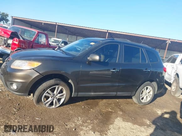 ✅ 2011 Hyundai Santa Fe Limited • VIN: 5XYZK4AG6BG074699 • Лот: 43347380. Опубликован ранее на IAAI с пробегом 184 701 миль. Бесплатный доступ к архиву аукционных продаж из США и подробный отчёт об истории автомобиля на DreamBid. Изображение 14.
