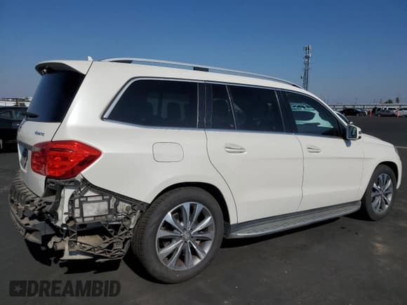 ✅ 2014 Mercedes-Benz GL 450 • VIN: 4JGDF7CE0EA306399 • Lot: 91103335. Wystawiony na Copart z przebiegiem 116 897 mil. Bezpłatny archiwum sprzedaży aukcyjnych z USA i szczegółowy raport historii pojazdu na DreamBid. Zdjęcie 3.