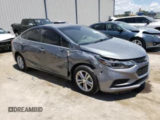 ✅ 2018 Chevrolet Cruze LT • VIN: 1G1BE5SM1J7241431 • Lot: 63491543. Listed on Copart with 64,775 mi. Free auction sales archive from the USA and detailed vehicle history report at DreamBid. Image 4.