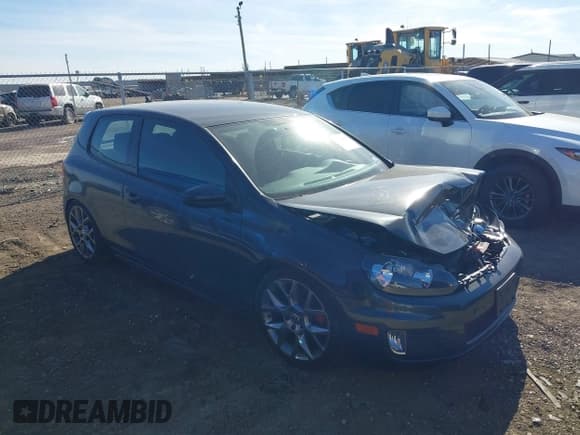 ✅ 2012 Volkswagen Golf GTI w/Conv & Sunroof • VIN: WVWEV7AJ6CW161963 • Lot: 41398810. Listed on IAAI with 172,582 mi. Free auction sales archive from the USA and detailed vehicle history report at DreamBid. Image 1.