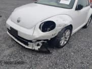 ✅ 2014 Volkswagen Beetle 2.0L TDI w/Sun/Sound/Nav • VIN: 3VWJL7AT1EM667366 • Lot: 43104884. Wystawiony na IAAI z przebiegiem 52 218 mil. Bezpłatny archiwum sprzedaży aukcyjnych z USA i szczegółowy raport historii pojazdu na DreamBid. Zdjęcie 6.