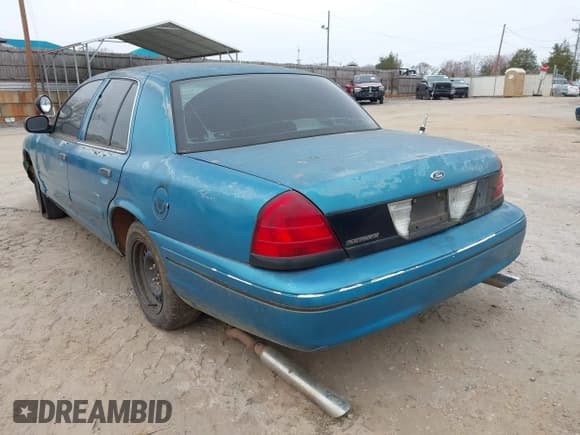 ✅ 2000 Ford Crown Victoria Police Interceptor • VIN: 2FAFP71W4YX136846 • Лот: 41715363. Опубликован ранее на IAAI с пробегом 335 956 миль. Бесплатный доступ к архиву аукционных продаж из США и подробный отчёт об истории автомобиля на DreamBid. Изображение 3.