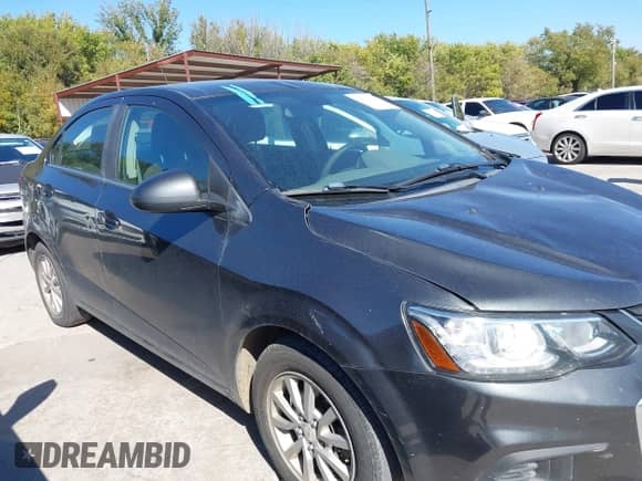 2019 Chevrolet Sonic LT with VIN 1G1JD5SBXK4110059, listed as a IAAI auction lot 43630938 with 87,435 mi miles and . Bid and sale history available at DreamBid. Image 13.
