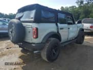 ✅ 2021 Ford Bronco • VIN: 1FMDE5BHXMLA96979 • Lot: 57878665. Listed on Copart with 20,893 mi. Free auction sales archive from the USA and detailed vehicle history report at DreamBid. Image 3.