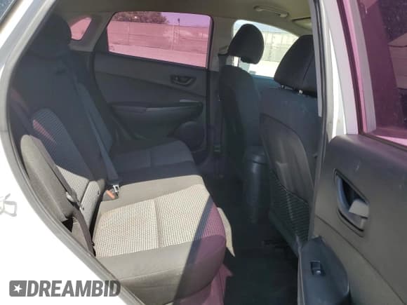 ✅ 2018 Hyundai Kona SE • VIN: KM8K12AA3JU091053 • Лот: 69489344. Опубликован ранее на Copart с пробегом 104 582 миль. Бесплатный доступ к архиву аукционных продаж из США и подробный отчёт об истории автомобиля на DreamBid. Изображение 10.