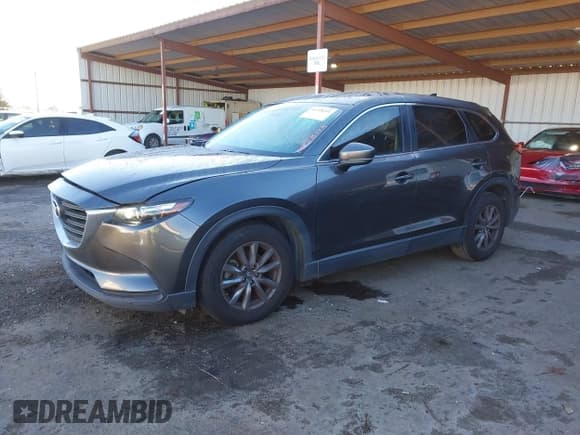 ✅ 2018 Mazda CX-9 Sport • VIN: JM3TCABY8J0203093 • Lot: 41218241. Listed on IAAI with 130,832 mi. Free auction sales archive from the USA and detailed vehicle history report at DreamBid. Image 2.