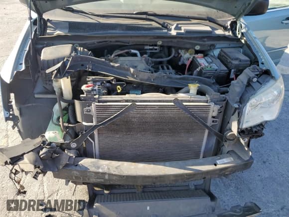 ✅ 2009 Chrysler Town & Country LX • VIN: 2A8HR44E79R607062 • Лот: 80323985. Опубликован ранее на Copart с пробегом 72 731 миль. Бесплатный доступ к архиву аукционных продаж из США и подробный отчёт об истории автомобиля на DreamBid. Изображение 12.