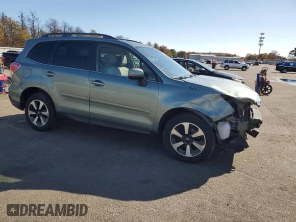 2017 Subaru Forester Limited with VIN JF2SJARC0HH523882, listed as a Copart auction lot 82651095 with 65,088 mi miles and Salvage title. Bid and sale history available at DreamBid. Image 4.