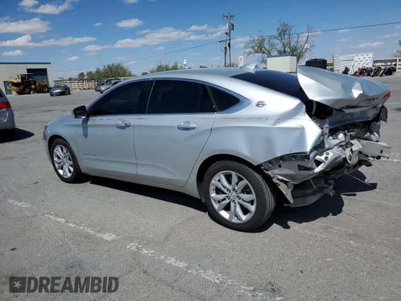 ✅ 2018 Chevrolet Impala LT • VIN: 1G1105S3XJU148359 • Лот: 71854994. Опубликован ранее на Copart с пробегом 100 789 миль. Бесплатный доступ к архиву аукционных продаж из США и подробный отчёт об истории автомобиля на DreamBid. Изображение 2.