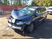 ✅ 2025 Honda Odyssey Touring • VIN: 5FNRL6H87SB051608 • Lot: 43583711. Listed on IAAI with 4,051 mi. Free auction sales archive from the USA and detailed vehicle history report at DreamBid. Image 19.