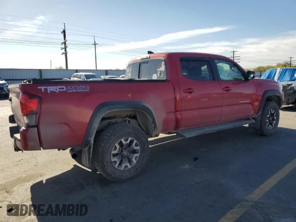 ✅ 2018 Toyota Tacoma TRD Off Road • VIN: 3TMDZ5BN6JM048050 • Lot: 85717605. Listed on Copart with 115,626 mi. Free auction sales archive from the USA and detailed vehicle history report at DreamBid. Image 3.