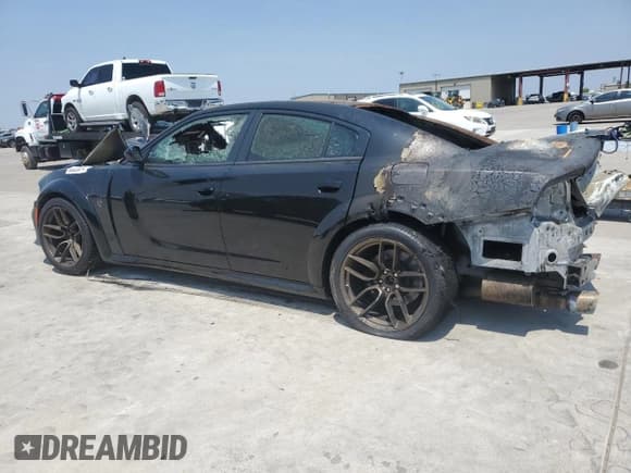 ✅ 2022 Dodge Charger SRT Hellcat Widebody • VIN: 2C3CDXL96NH229956 • Lot: 66809074. Listed on Copart with Not provided. Free auction sales archive from the USA and detailed vehicle history report at DreamBid. Image 2.