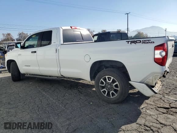 ✅ 2017 Toyota Tundra SR • VIN: 5TFTY5F16HX009503 • Lot: 84199964. Listed on Copart with 119,255 mi. Free auction sales archive from the USA and detailed vehicle history report at DreamBid. Image 2.