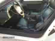 1993 Chevrolet Corvette z VIN 1G1YY23P8P5112521, wystawiony jako Copart lot #85591474 z przebiegiem 176 246 mil mil oraz Szkoda całkowita • Salvage title. Historia ofert i sprzedaży dostępna na DreamBid. Obrazek 7.