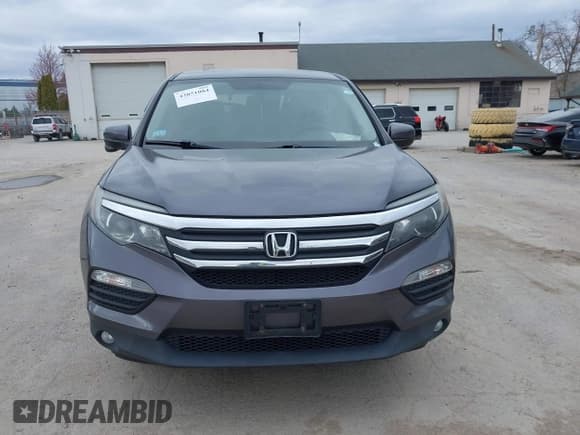 ✅ 2017 Honda Pilot EX-L • VIN: 5FNYF6H52HB024950 • Lot: 42051084. Listed on IAAI with Not provided. Free auction sales archive from the USA and detailed vehicle history report at DreamBid. Image 11.