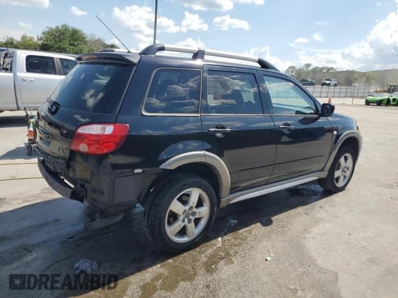 ✅ 2005 Mitsubishi Outlander XLS • VIN: JA4LX41F05U004692 • Лот: 60431695. Опубликован ранее на Copart с пробегом 218 356 миль. Бесплатный доступ к архиву аукционных продаж из США и подробный отчёт об истории автомобиля на DreamBid. Изображение 3.