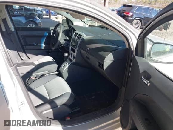 2009 Dodge Caliber SXT с VIN 1B3HB48A69D148629, выставлен на аукционе IAAI как лот 41303854 с пробегом 58 536 миль миль и . История ставок и продаж доступна на DreamBid. Изображение 5.