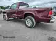 2000 Dodge Dakota Sport z VIN 1B7GG26N5YS650791, wystawiony jako Copart lot #63601765 z przebiegiem 80 841 mil mil oraz Szkoda całkowita • Salvage title. Historia ofert i sprzedaży dostępna na DreamBid. Obrazek 2.
