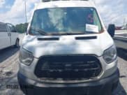 ✅ 2017 Ford Transit • VIN: 1FDYR2CM2HKA82358 • Lot: 42231257. Listed on IAAI with 271,518 mi. Free auction sales archive from the USA and detailed vehicle history report at DreamBid. Image 12.