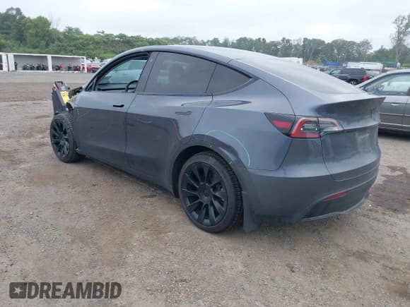 ✅ 2023 Tesla Model Y Long Range • VIN: 7SAYGDEE3PF696104 • Lot: 43016890. Wystawiony na IAAI z przebiegiem 27 769 mil. Bezpłatny archiwum sprzedaży aukcyjnych z USA i szczegółowy raport historii pojazdu na DreamBid. Zdjęcie 3.