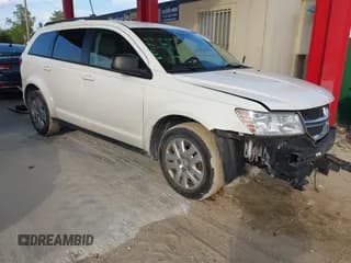 ✅ 2018 Dodge Journey SE • VIN: 3C4PDCAB2JT228039 • Lot: 43587686. Listed on IAAI with 124,001 mi. Free auction sales archive from the USA and detailed vehicle history report at DreamBid. Image 1.