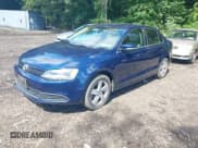 ✅ 2014 Volkswagen Jetta TDI w/Premium/Nav • VIN: 3VWLL7AJ3EM232789 • Lot: 42737539. Listed on IAAI with 60,263 mi. Free auction sales archive from the USA and detailed vehicle history report at DreamBid. Image 2.