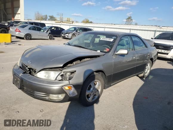 ✅ 1999 Lexus ES 300 • VIN: JT8BF28G7X0207952 • Lot: 90859785. Listed on Copart with 160,420 mi. Free auction sales archive from the USA and detailed vehicle history report at DreamBid. Image 1.