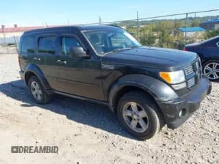 2010 Dodge Nitro SXT z VIN 1D4PU5GK2AW130547, wystawiony jako IAAI lot #43350699 z przebiegiem 139 960 mil mil oraz . Historia ofert i sprzedaży dostępna na DreamBid. Obrazek 1.