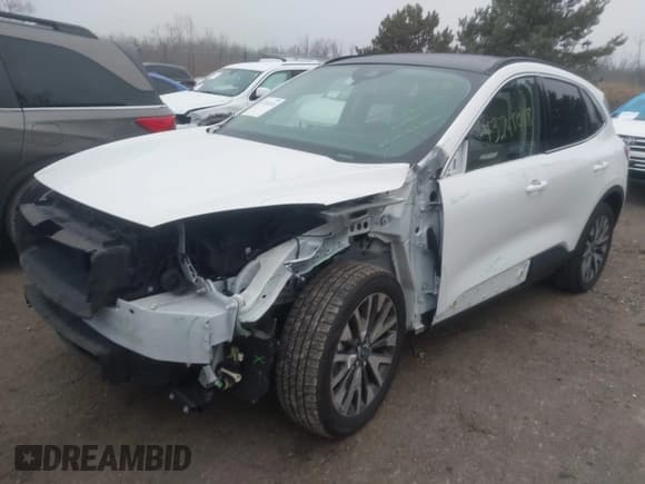 ✅ 2020 Ford Escape Titanium • VIN: 1FMCU9J98LUA08973 • Lot: 43745018. Listed on IAAI with 47,121 mi. Free auction sales archive from the USA and detailed vehicle history report at DreamBid. Image 2.